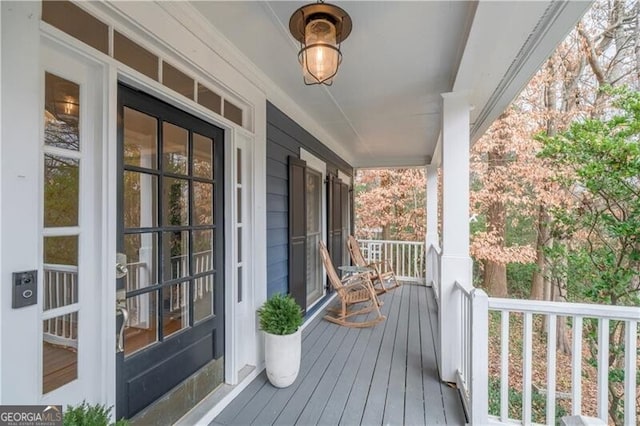 deck featuring covered porch