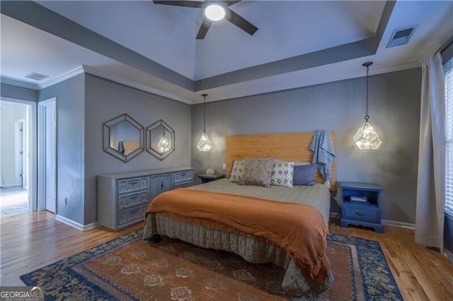 bedroom featuring ceiling fan and light hardwood / wood-style flooring