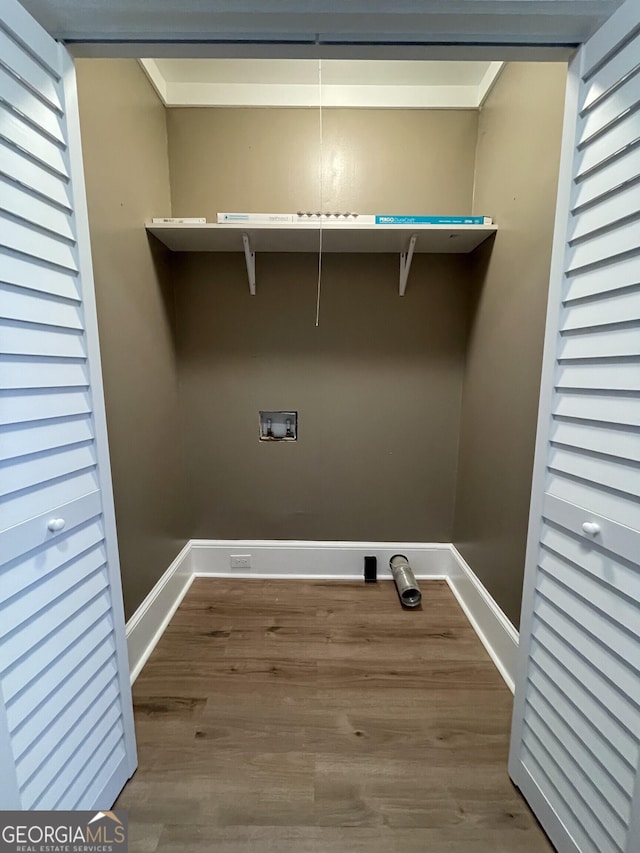 washroom featuring washer hookup and hardwood / wood-style flooring