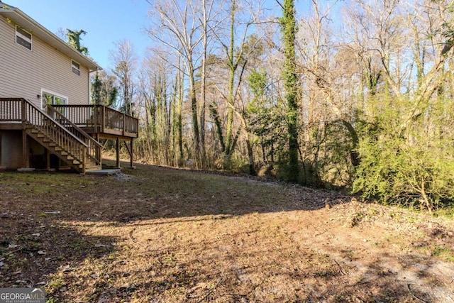 view of yard featuring a deck