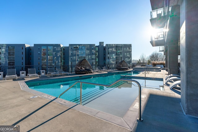 view of pool with a patio area