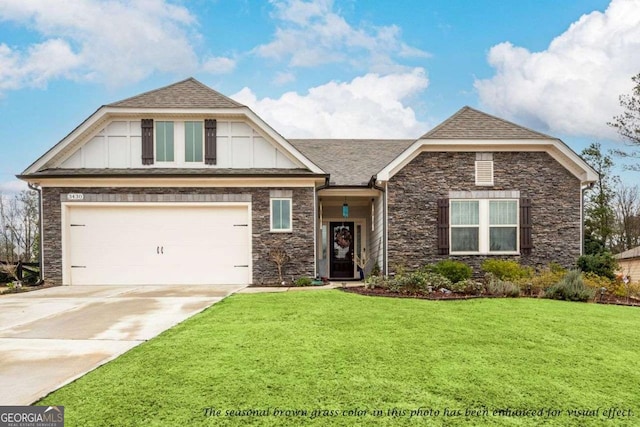 craftsman-style house with a front yard and a garage