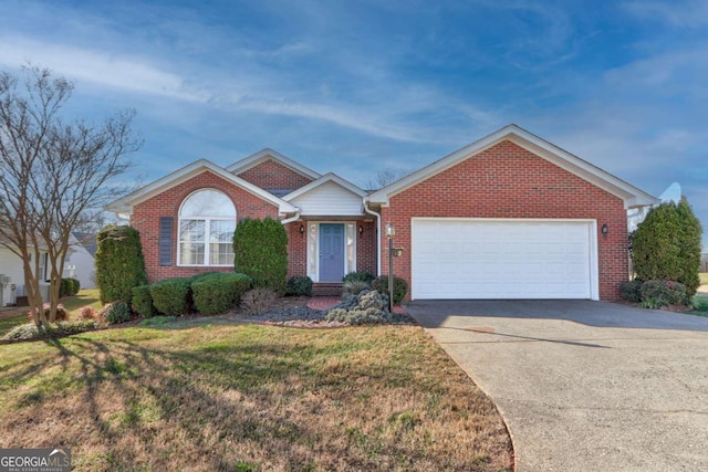 ranch-style home featuring a front lawn and a garage