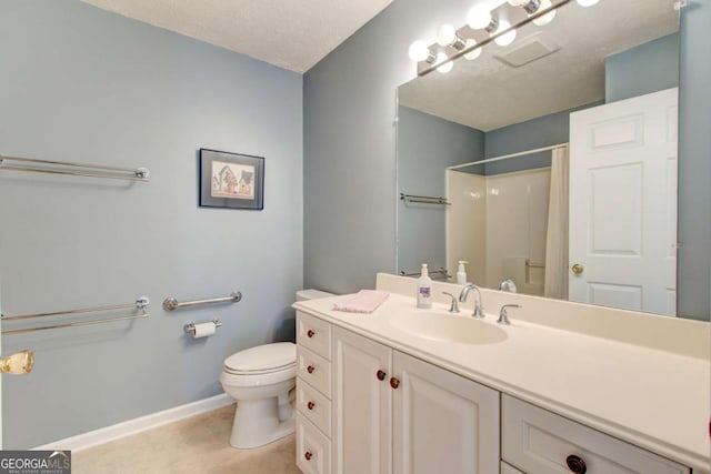 bathroom featuring vanity, curtained shower, toilet, and a textured ceiling