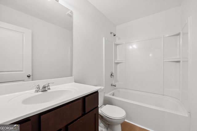 full bathroom with vanity, tub / shower combination, wood-type flooring, and toilet