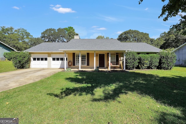 single story home with a front lawn, covered porch, and a garage