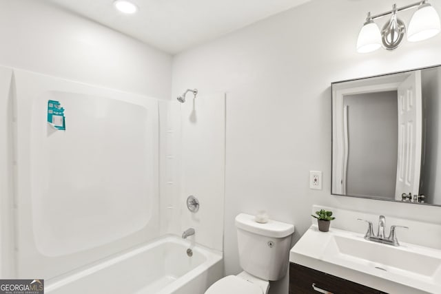 full bathroom featuring vanity, toilet, and bathing tub / shower combination