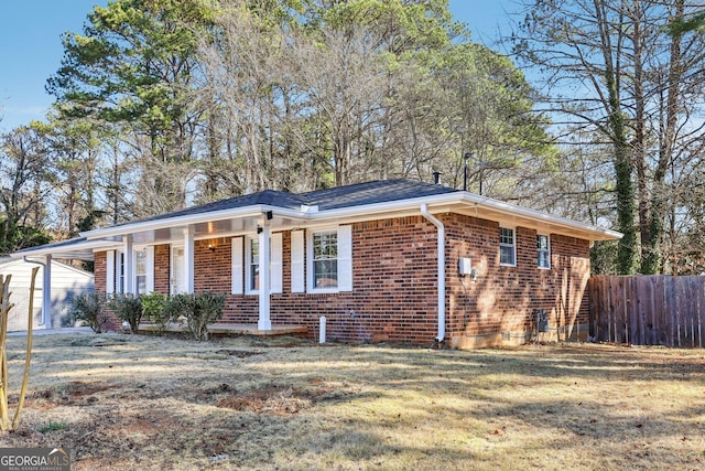 ranch-style house with a front yard