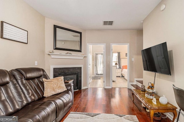 living room featuring dark hardwood / wood-style floors