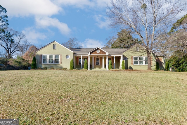 single story home featuring a front yard