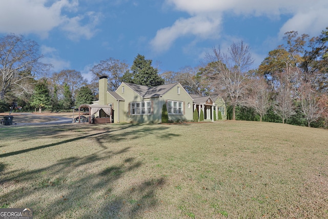 view of home's exterior featuring a yard