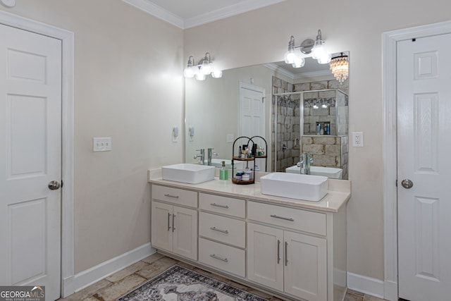 bathroom with crown molding, vanity, and a shower with shower door