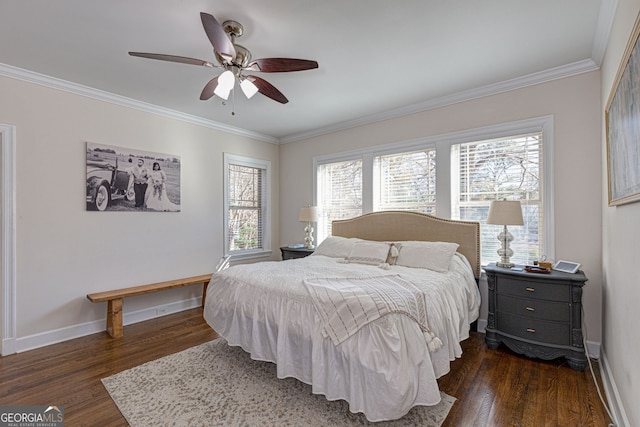 bedroom with ceiling fan, dark hardwood / wood-style floors, and ornamental molding