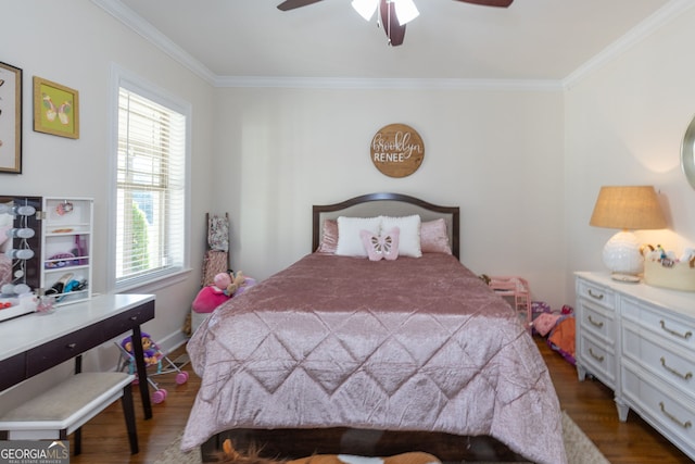 bedroom featuring ceiling fan, crown molding, and multiple windows