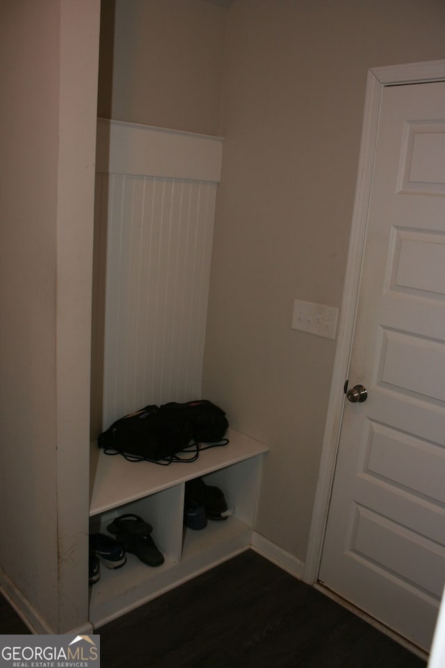 mudroom with dark hardwood / wood-style floors