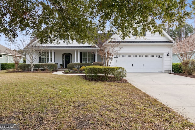 view of front facade with a garage and a front yard