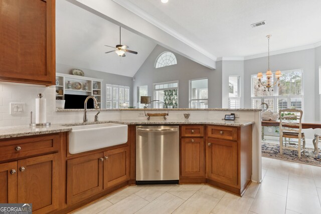 kitchen with stainless steel appliances, decorative backsplash, light stone counters, and custom range hood