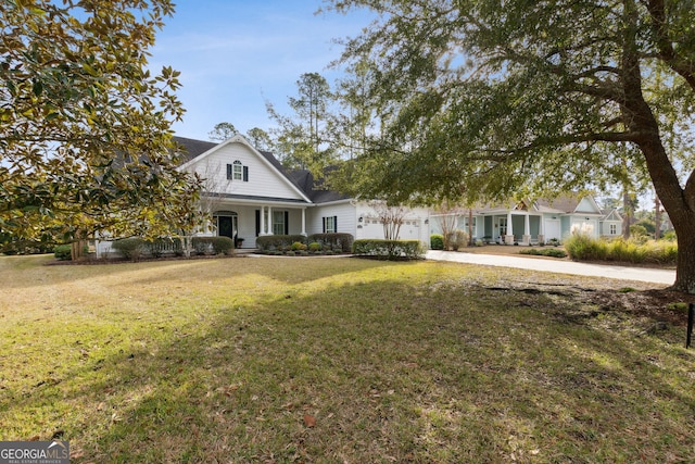 view of front of property with a front lawn and covered porch