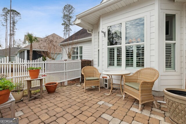 rear view of house with a yard