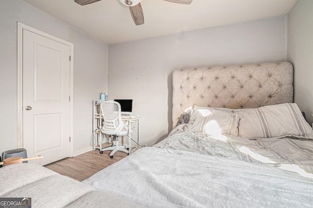 bedroom featuring ceiling fan and light hardwood / wood-style floors