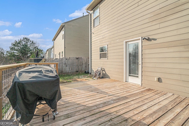 wooden deck with grilling area