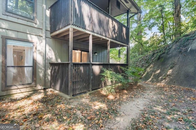 view of home's exterior featuring a balcony