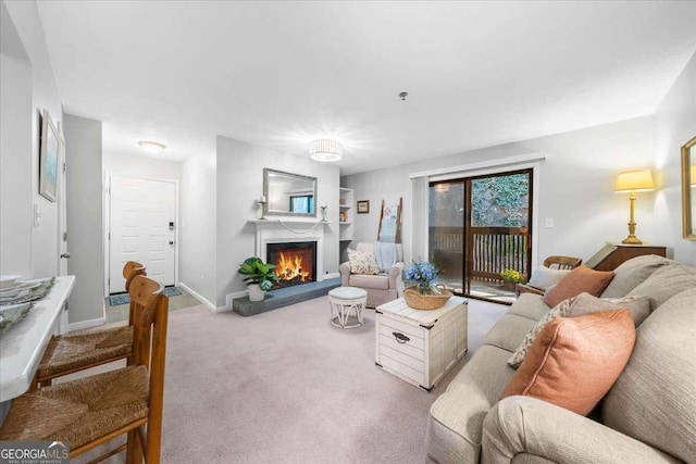 living room featuring light carpet