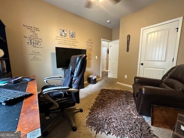 office with ceiling fan and carpet floors