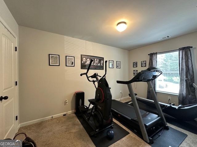 exercise room with carpet floors