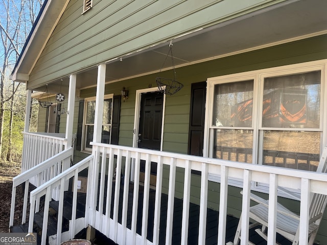 property entrance with a porch