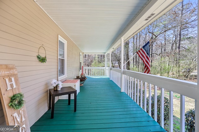 wooden terrace with covered porch