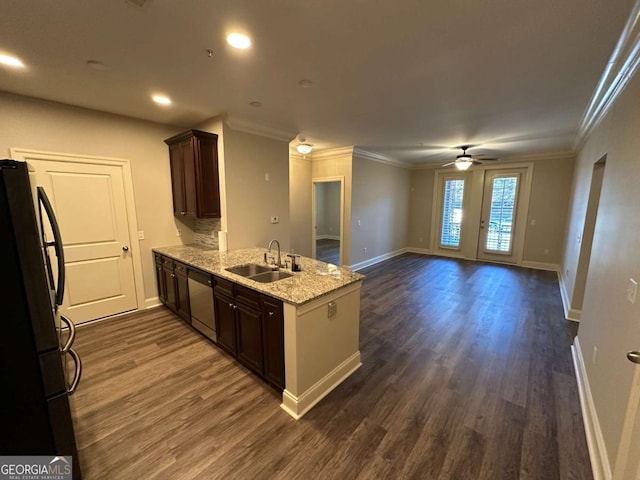 kitchen with ceiling fan, black refrigerator, sink, and dark wood-type flooring