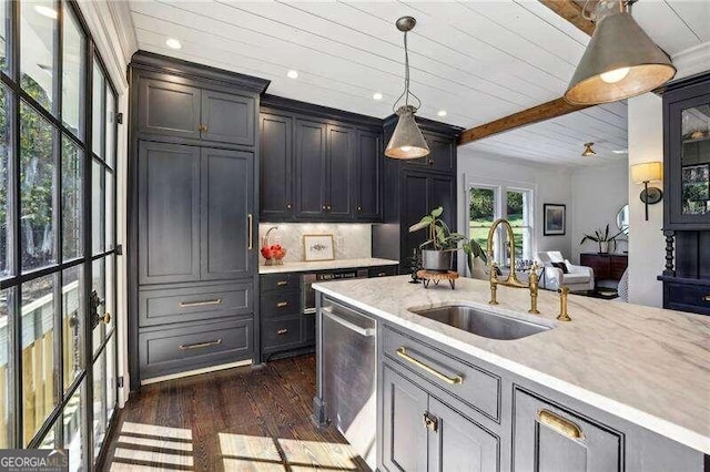 kitchen with sink, pendant lighting, beam ceiling, dishwasher, and dark hardwood / wood-style floors