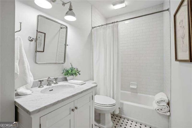 full bathroom featuring vanity, toilet, and shower / bathtub combination with curtain