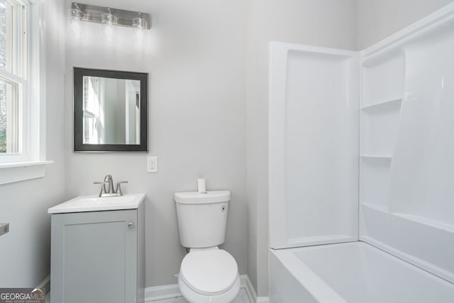 full bathroom featuring vanity, toilet, and bathtub / shower combination