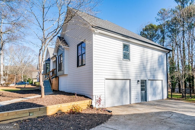 view of home's exterior featuring a garage