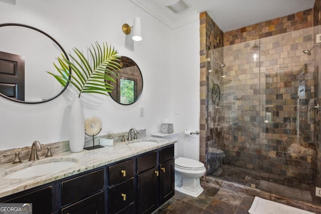 bathroom with vanity, toilet, walk in shower, and ornamental molding