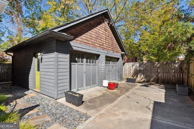 view of outdoor structure featuring a garage