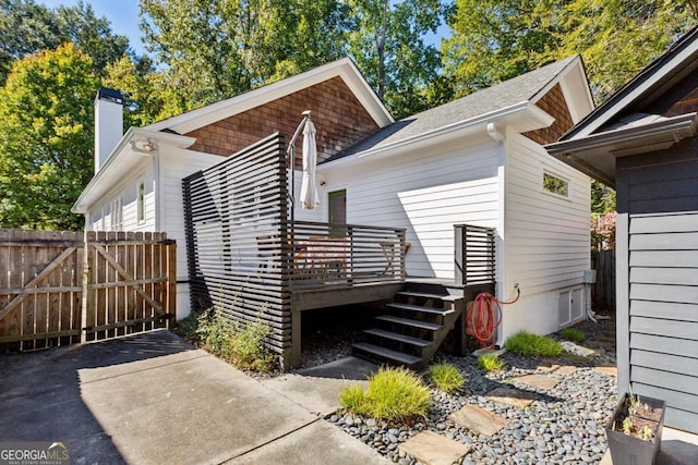 exterior space with a wooden deck