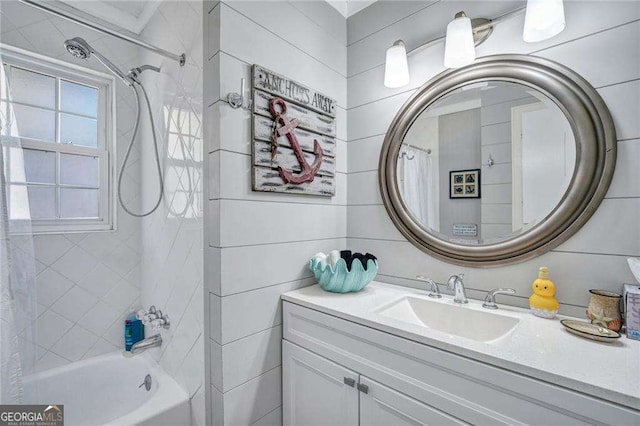 bathroom with vanity and shower / tub combo