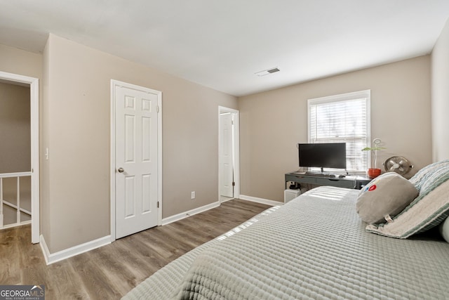 bedroom featuring light wood-type flooring