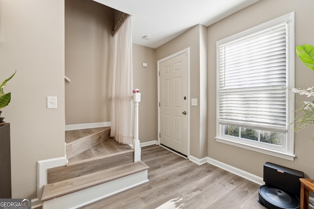 foyer with light wood-type flooring