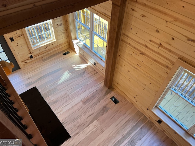 unfurnished living room featuring light hardwood / wood-style flooring