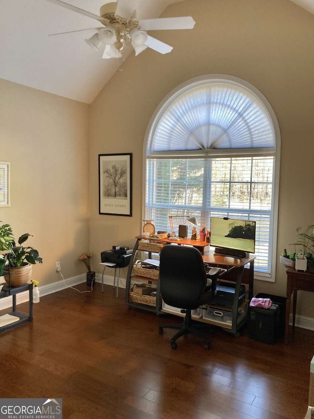 office with ceiling fan, dark hardwood / wood-style flooring, and high vaulted ceiling