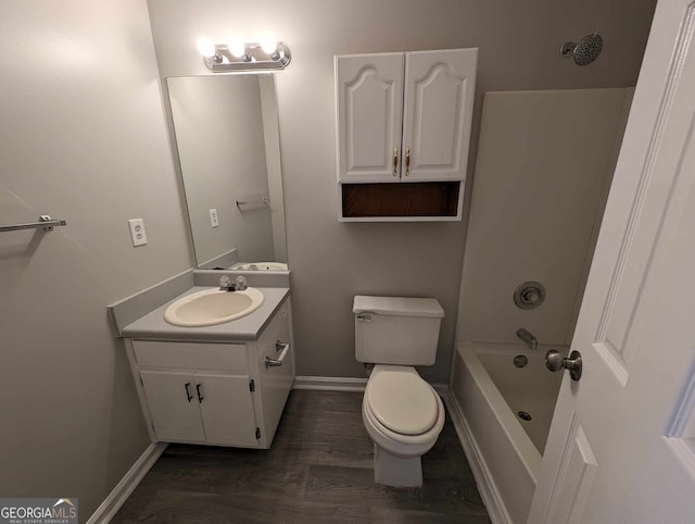 full bathroom featuring toilet, vanity, wood-type flooring, and shower / washtub combination