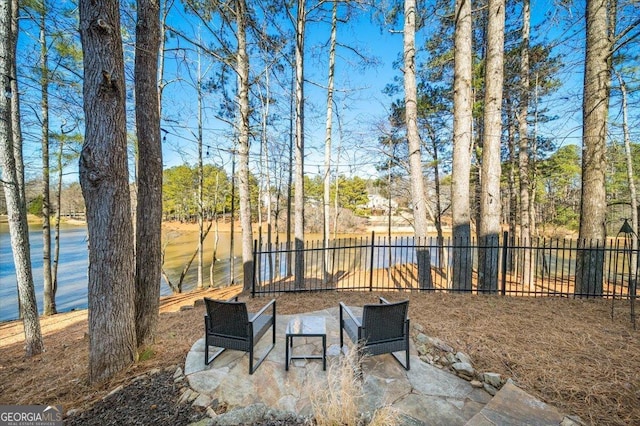 view of patio featuring a water view