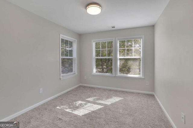 view of carpeted spare room