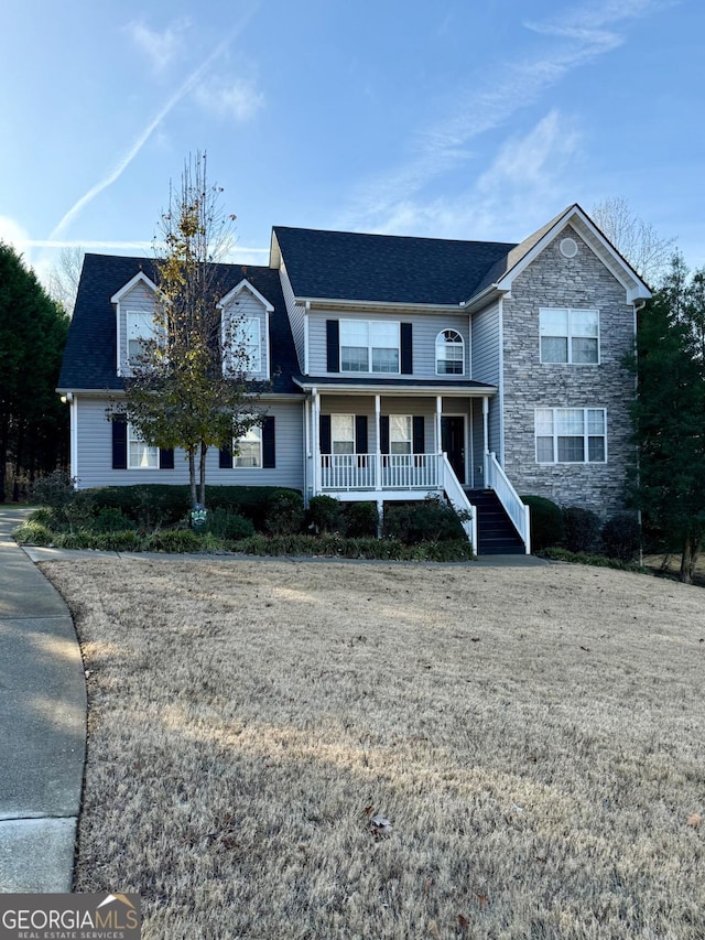 view of front property with covered porch