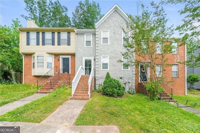 view of property with a front lawn