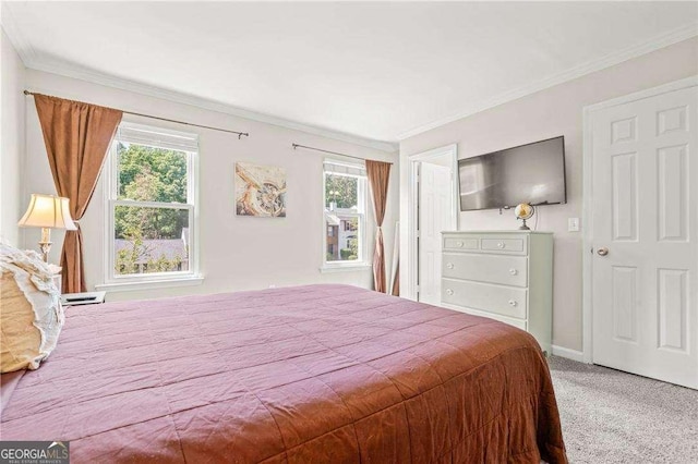 carpeted bedroom featuring ornamental molding